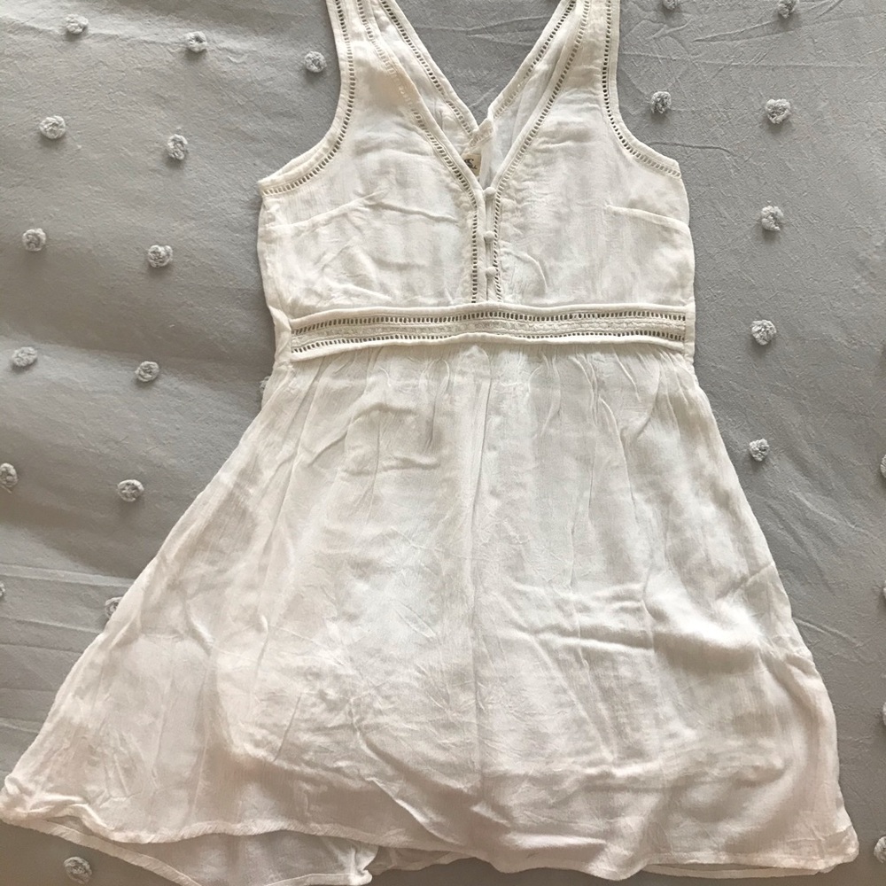 Flowy, white, cotton mini baby doll dress.